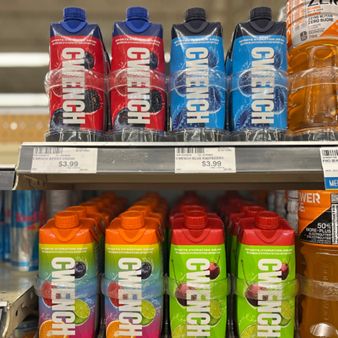 All four RTD flavours of CWENCH Hydration™ are shown on a retail shelf at a Calgary Co-op supermarket in the Calgary, Alberta area (Photo: Business Wire)