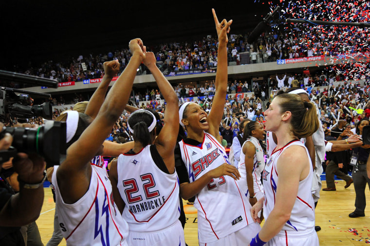 Plenette Pierson (#23) of the Detroit Shock celebrates after winning game three of the WNBA Finals against the San Antonio Silver Star 