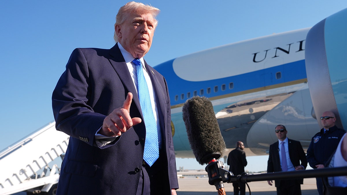 President Donald Trump speaking with the media before boarding Air Force One.