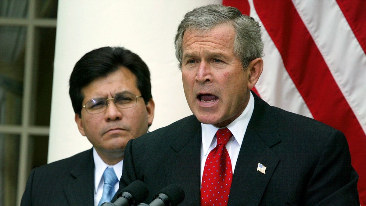 Alberto Gonzales and George Bush